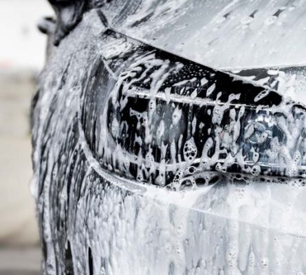 Car cleaning. Wash car with soap.  High pressure water washing ; Shutterstock ID 788107234; purchase_order: -; job: -; client: -; other: -